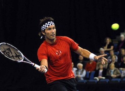 Pat Cash getting ready to hit a volley